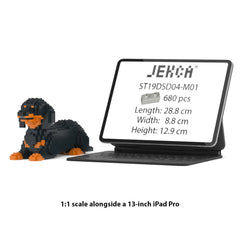 Real size of the Dachshund 04-M01 next to a 13-inch tablet