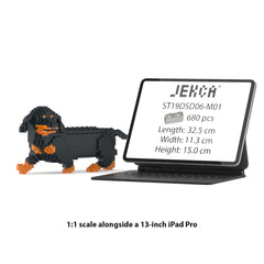 Real size of the Dachshund 06-M01 next to a 13-inch tablet