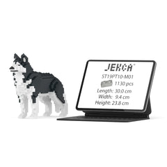 Real size of the Husky 01-M01 next to a 13-inch tablet