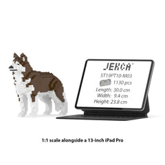 Real size of the Husky 01-M03 next to a 13-inch tablet