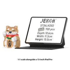 Real size of the Lucky Shiba Inu Mini 01 next to a 13-inch tablet